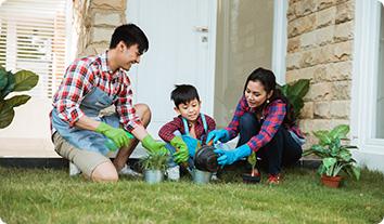 a family sitting on the grass