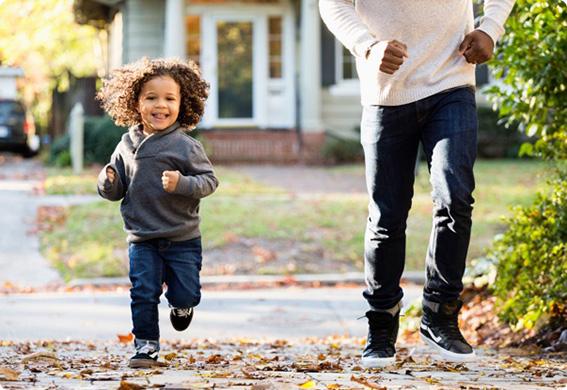 a person and a child running