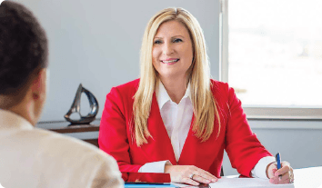 a woman in a red suit