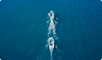 one boat towing another