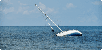 a partially sunk sailboat