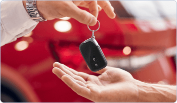 car keys being handed over to someone