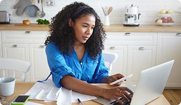 a woman working on her laptop