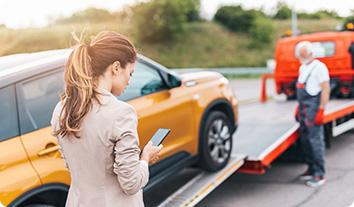 a person looking at a car