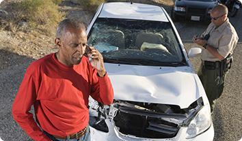 a man standing next to a car