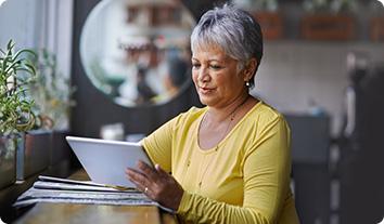 a person looking at a laptop