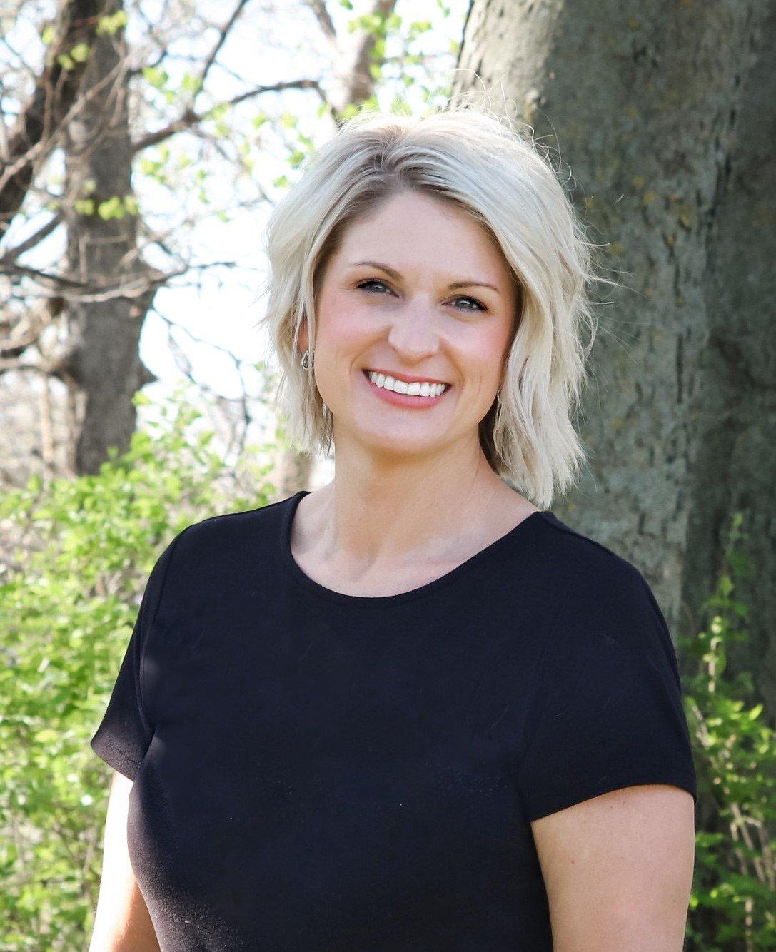 a woman smiling for the camera