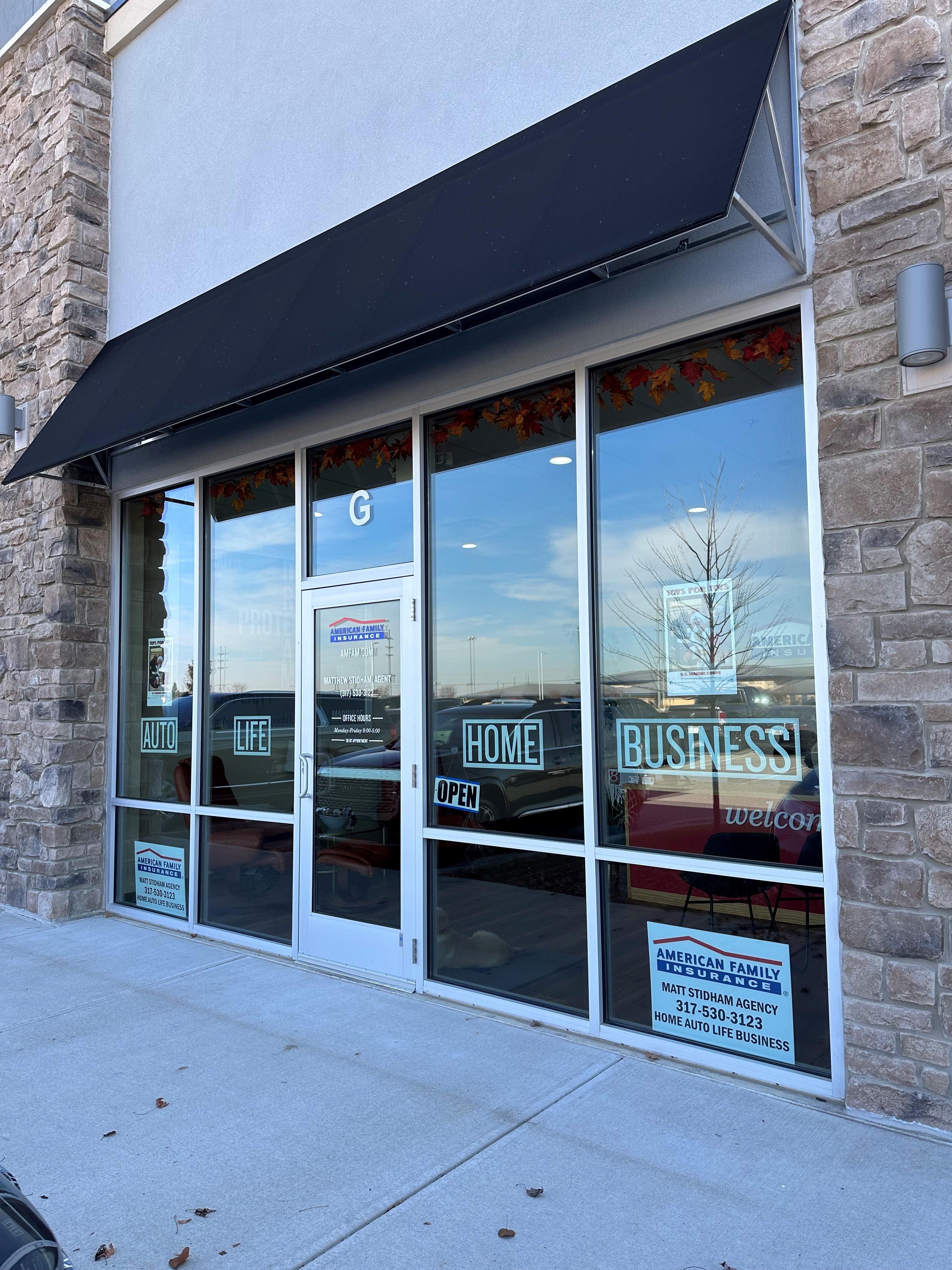 a store front with glass doors