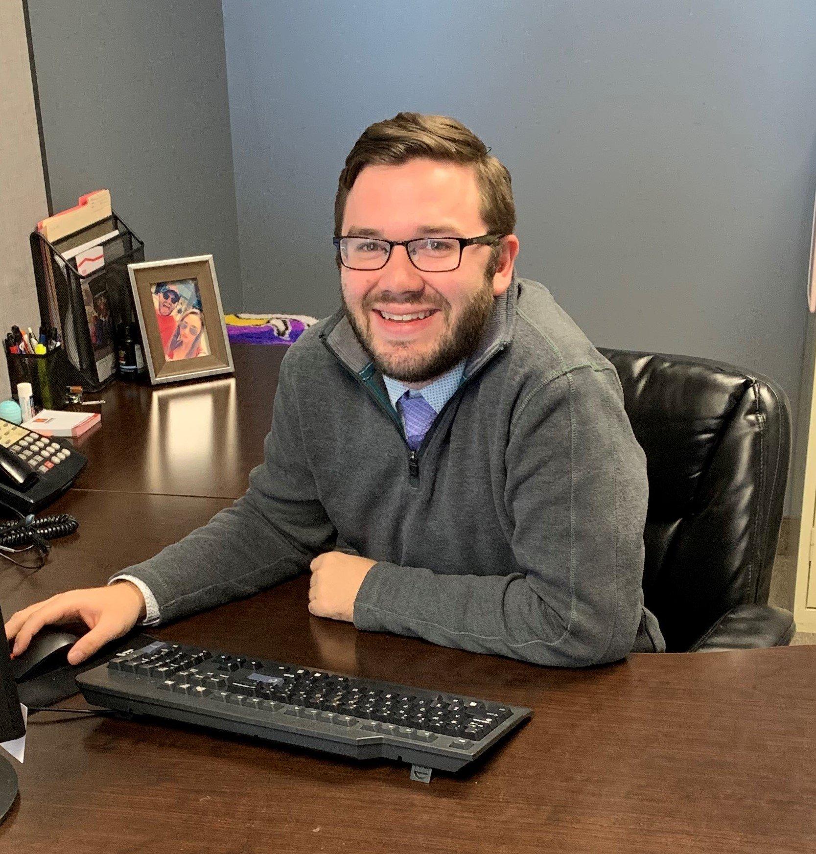 a man sitting at a desk