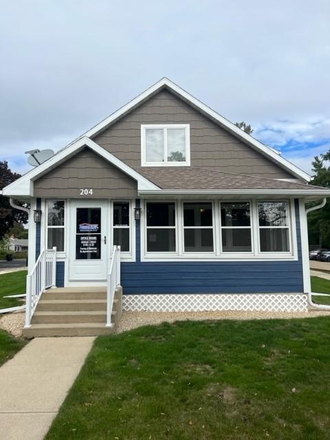 a house with a lawn in front