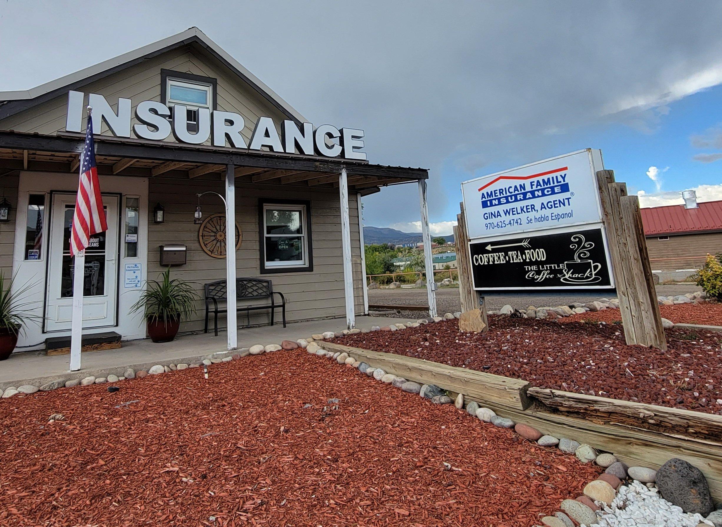 a building with a sign in front