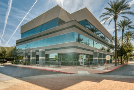 a building with palm trees