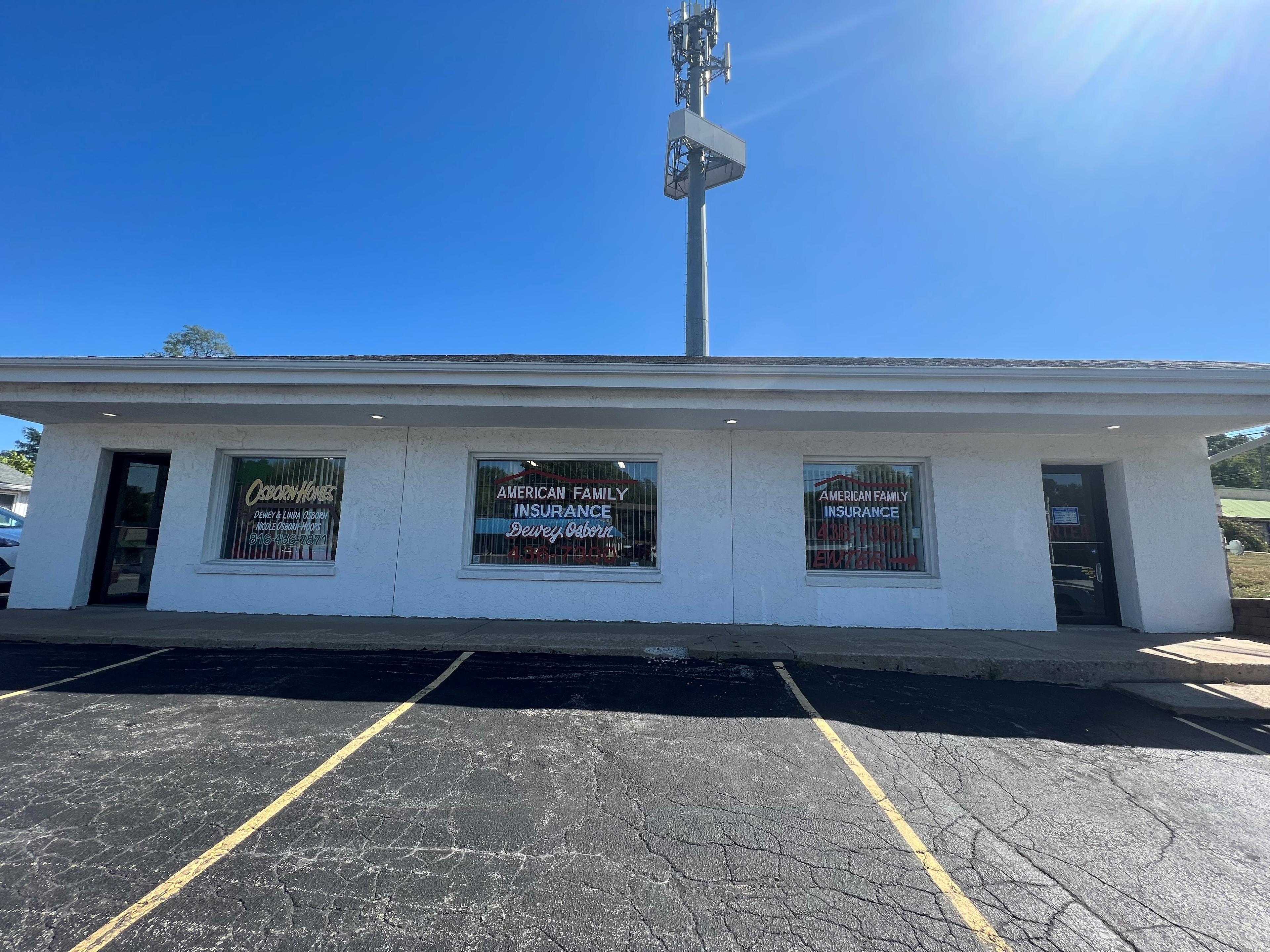 a white building with a sign on it