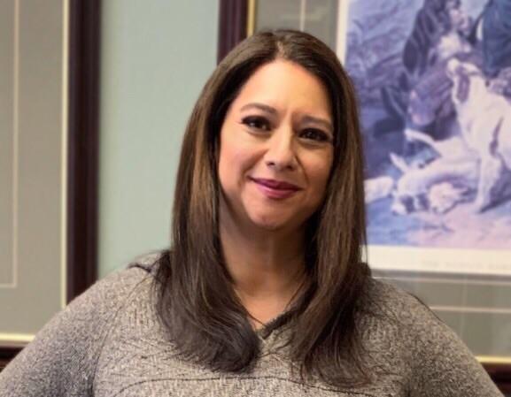 a woman smiling for the camera