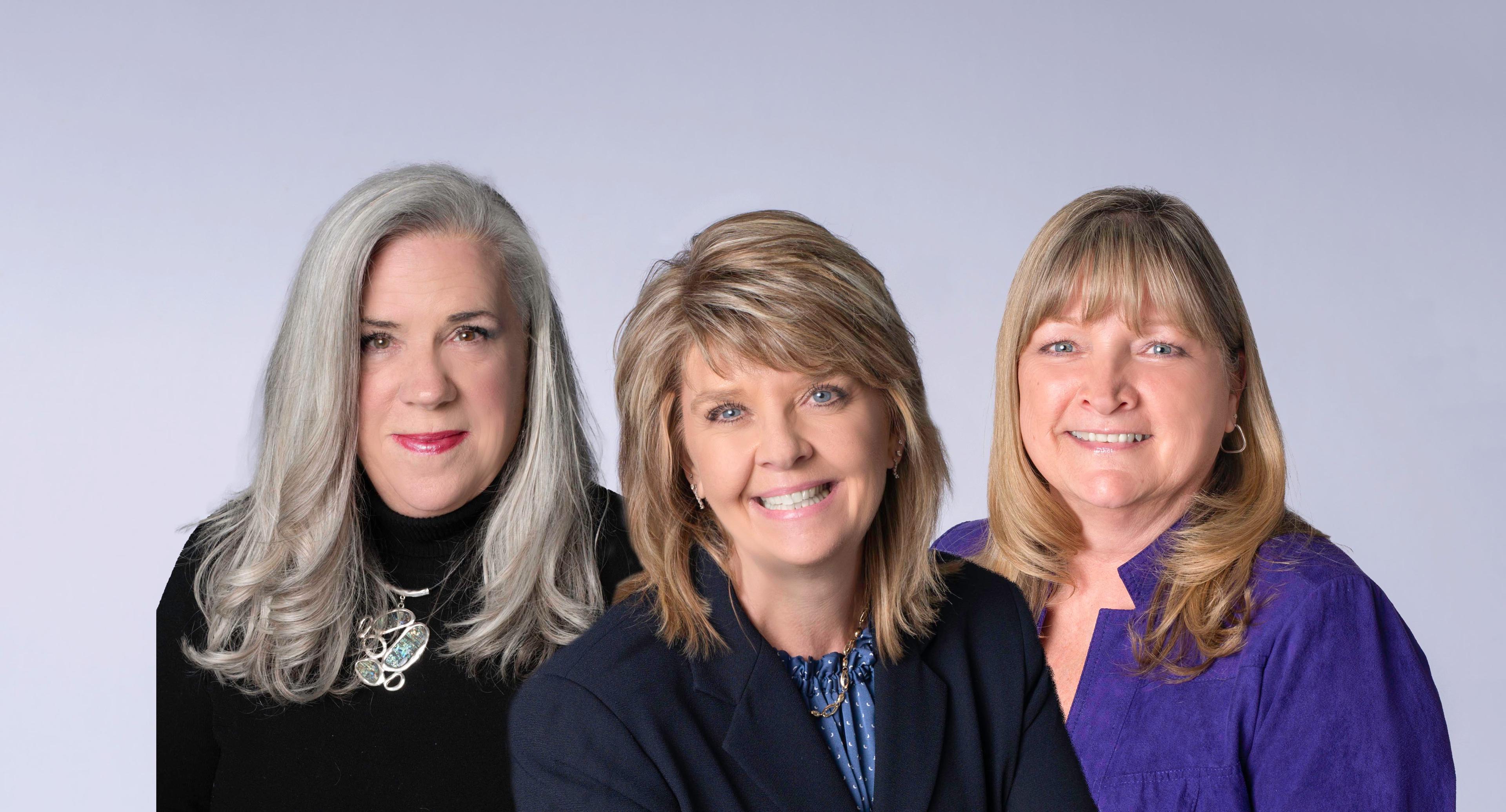 a group of women smiling