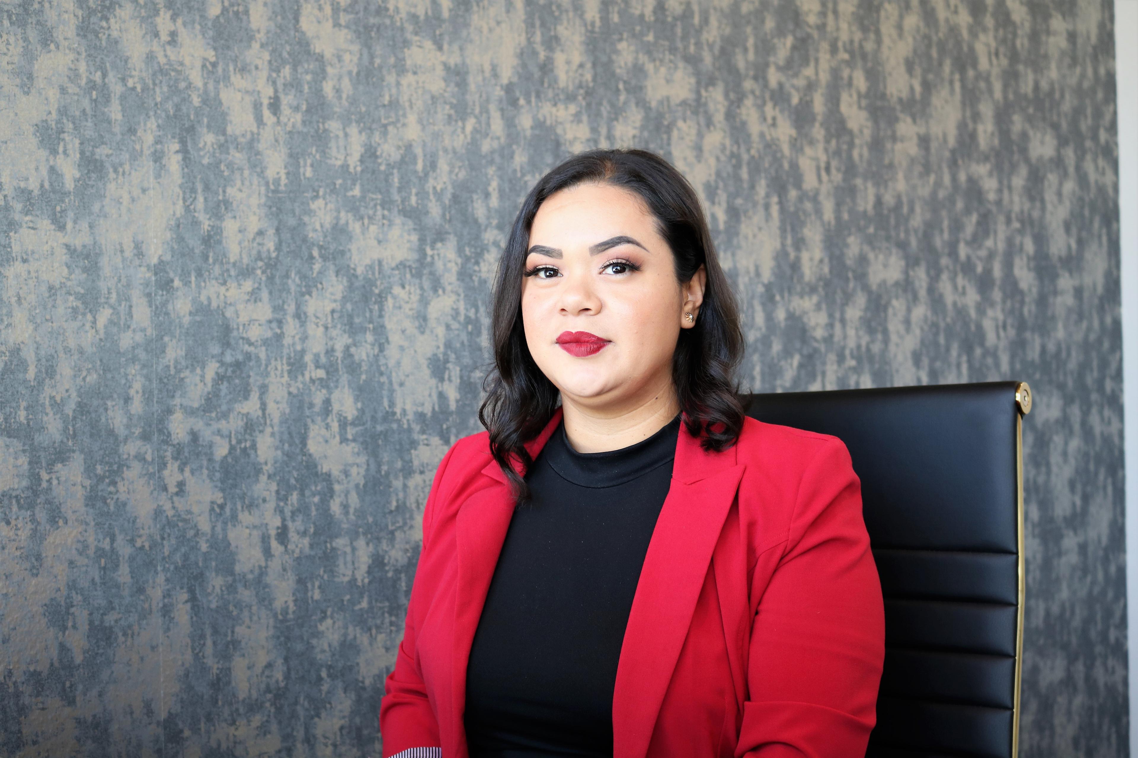 a woman in a red jacket