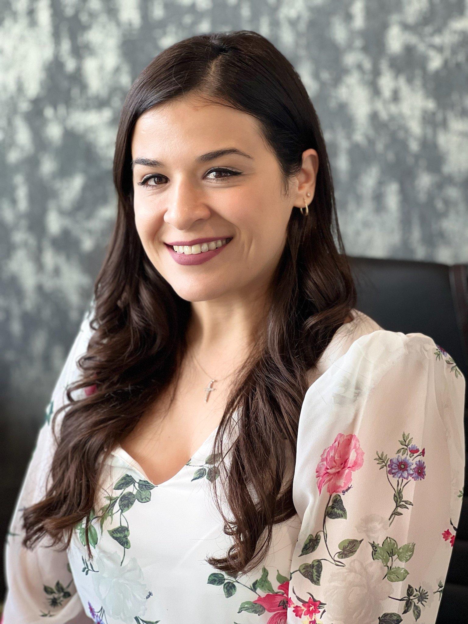 a woman smiling for the camera