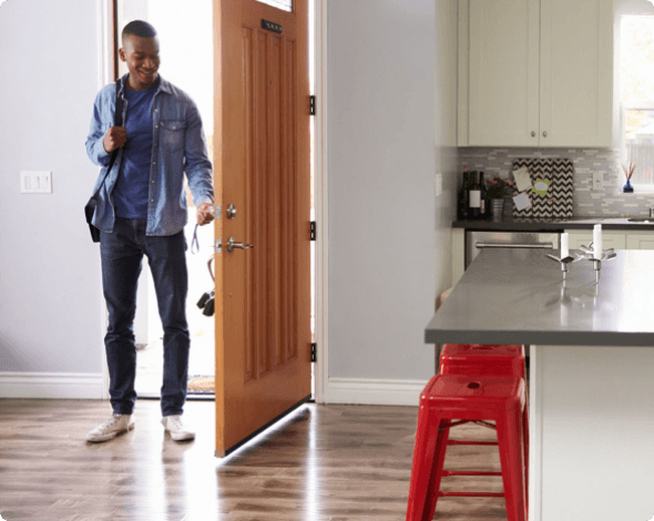 a man entering his apartment