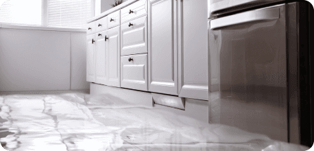 a room with white cabinets