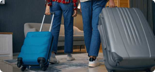 People leaving a room with luggages